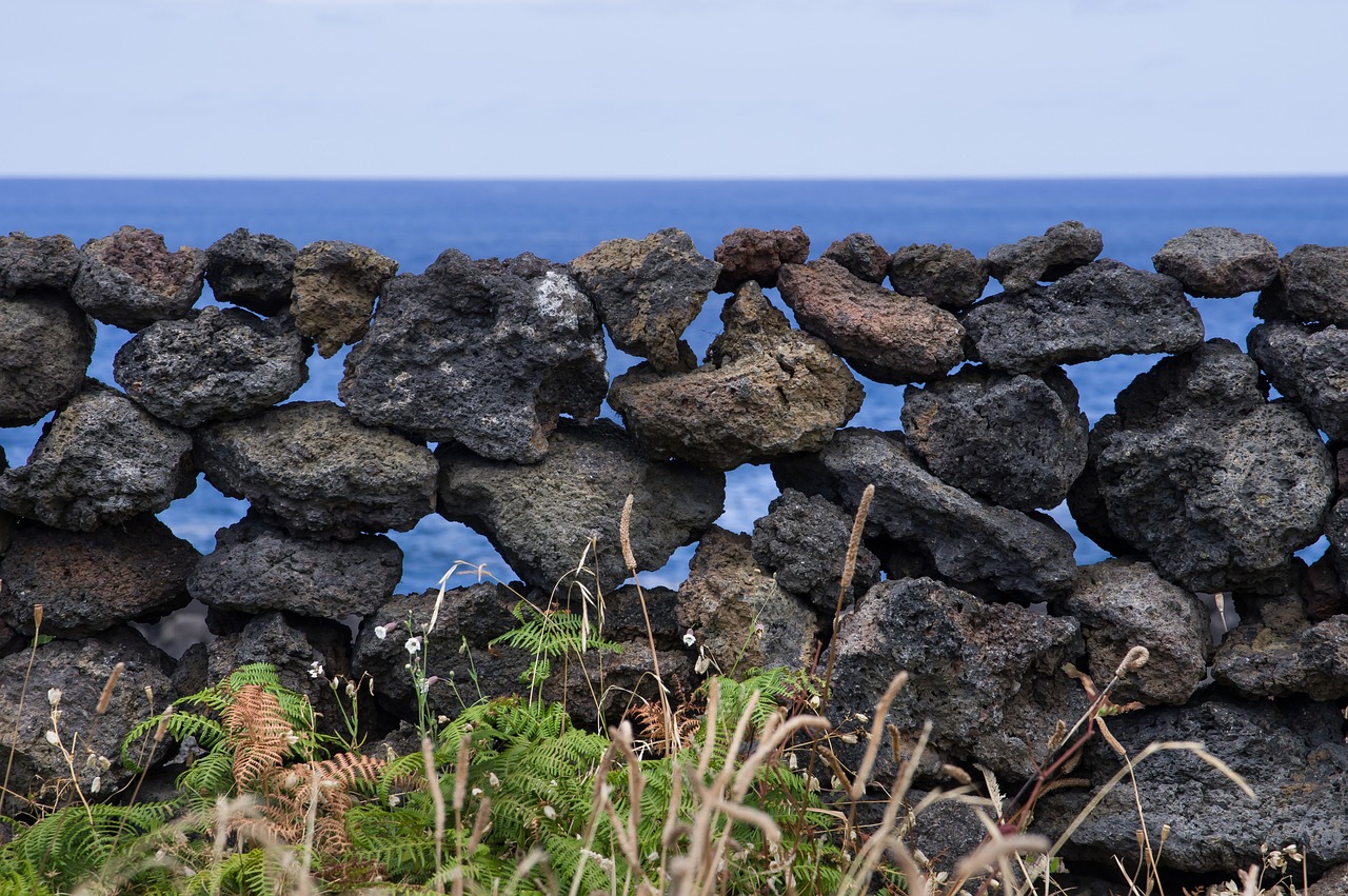 The beginnings of a rock wall, symbolizing the process of turning structure into real features.